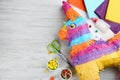 Flat lay composition with cardboard donkey and materials on white wooden table, space for text. Pinata DIY Royalty Free Stock Photo