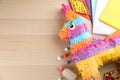 Flat lay composition with cardboard donkey on wooden table, space for text. Pinata diy Royalty Free Stock Photo