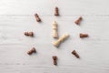 Flat lay composition with chess pieces on white wooden background Royalty Free Stock Photo