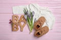 Flat lay composition with child`s clothes on pink table Royalty Free Stock Photo