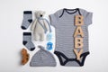 Flat lay composition with child`s clothes and word Baby on table Royalty Free Stock Photo