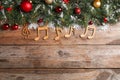 Flat lay composition with Christmas  and music notes on wooden table, space for text Royalty Free Stock Photo