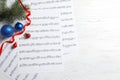 Flat lay composition with Christmas decorations and music sheets Royalty Free Stock Photo