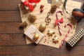 Flat lay composition with Christmas decorations, music sheets and headphones Royalty Free Stock Photo