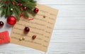 Flat lay composition with Christmas decorations and music sheets on white wooden table Royalty Free Stock Photo