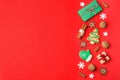 Flat lay composition with Christmas decorations and treats on background, space for text. Winter holidays