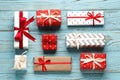 Flat lay composition of christmas gift boxes on a  wooden background Royalty Free Stock Photo