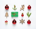 Flat lay composition with Christmas gift and festive decor Royalty Free Stock Photo