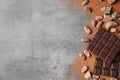 Flat lay composition with cocoa powder and chocolate Royalty Free Stock Photo