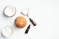 Flat lay composition with coconut oil on white background. SPA natural organic cosmetic, hair care concept
