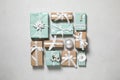 Flat lay composition of color Christmas gift boxes on light background Royalty Free Stock Photo