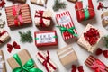 Flat lay composition of color Christmas gift boxes on light background Royalty Free Stock Photo