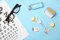 Flat lay composition with contact lenses Royalty Free Stock Photo