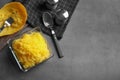 Flat lay composition with cooked spaghetti squash and space for text Royalty Free Stock Photo