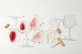 Flat lay composition. Corkscrew, glasses with different wine on white Royalty Free Stock Photo