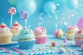 Flat lay composition with cupcakes on blue background Royalty Free Stock Photo