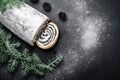 Flat lay composition with cut poppy seed roll with branch fir tree. Generate Ai Royalty Free Stock Photo