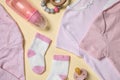 Flat lay composition with cute baby items on beige background