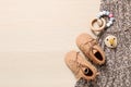 Flat lay composition with cute baby outfit on wooden background