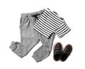 Flat lay composition with cute child clothes and shoes