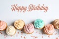 Flat lay composition with delicious birthday cupcakes and space for text Royalty Free Stock Photo
