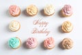 Flat lay composition with delicious birthday cupcakes and space for text Royalty Free Stock Photo