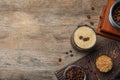 Flat lay composition with coffee cocktail on wooden table. Space for text