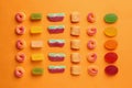 Flat lay composition with delicious jelly candies on color Royalty Free Stock Photo