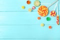 Flat lay composition with different candies and space for text Royalty Free Stock Photo