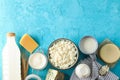 Flat lay composition. Different dairy products on blue background