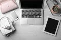 Flat lay composition with different devices on grey background. Blogger`s workplace