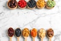 Flat lay composition with different dried fruits on marble background, space for text Royalty Free Stock Photo