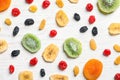 Flat lay composition with different dried fruits on wooden background Royalty Free Stock Photo