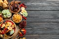 Flat lay composition with different dried fruits on wooden background Royalty Free Stock Photo