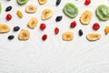 Flat lay composition with different dried fruits on wooden background, space for text Royalty Free Stock Photo