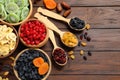 Flat lay composition with different dried fruits on wooden background, space for text Royalty Free Stock Photo