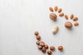 Flat lay composition with different kinds of nuts on light background Royalty Free Stock Photo