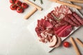 Flat lay composition with different meat delicacies and space for text Royalty Free Stock Photo