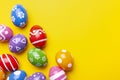 Flat lay composition with Easter eggs on color background. Frame made of decorated eggs. Top view with place for tex Royalty Free Stock Photo