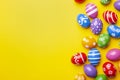 Flat lay composition with Easter eggs on color background. Frame made of decorated eggs. Top view with place for text Royalty Free Stock Photo