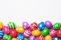 Flat lay composition with Easter eggs on color background. Frame made of decorated eggs. Top view with place for text Royalty Free Stock Photo