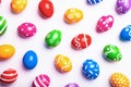 Flat lay composition with Easter eggs on light background. Frame made of decorated eggs. Top view Royalty Free Stock Photo