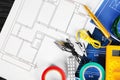 Flat lay composition with electrical tools on house plans Royalty Free Stock Photo