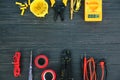 Flat lay composition with electrical tools on wooden background Royalty Free Stock Photo