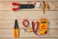 Flat lay composition with electrical tools on wooden background Royalty Free Stock Photo