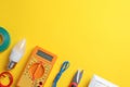 Flat lay composition with electrician`s tools and accessories on yellow background, space for text Royalty Free Stock Photo