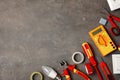 Flat lay composition with electrician`s tools and space for text Royalty Free Stock Photo