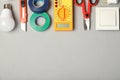 Flat lay composition with electrician`s tools and space for text Royalty Free Stock Photo