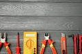 Flat lay composition with electrician`s tools and space for text Royalty Free Stock Photo