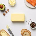 Flat lay composition with butter, sandwiches and avocado on white background Royalty Free Stock Photo